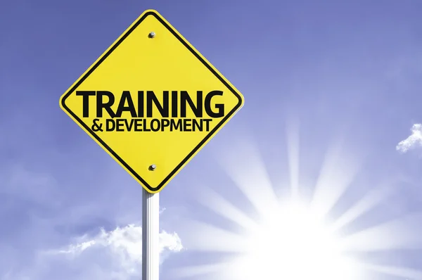 Placa de estrada de treinamento e desenvolvimento — Fotografia de Stock