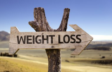Weight Loss wooden sign with a landscape background clipart