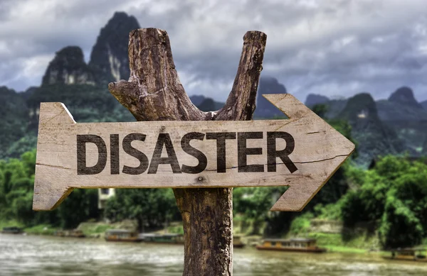 Disaster  wooden sign — Stock Photo, Image