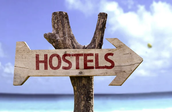 Hostels  wooden sign — Stock Photo, Image