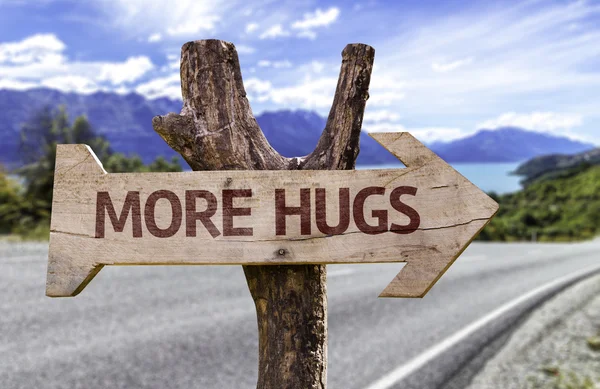 More  Hugs     wooden sign — Stock Photo, Image