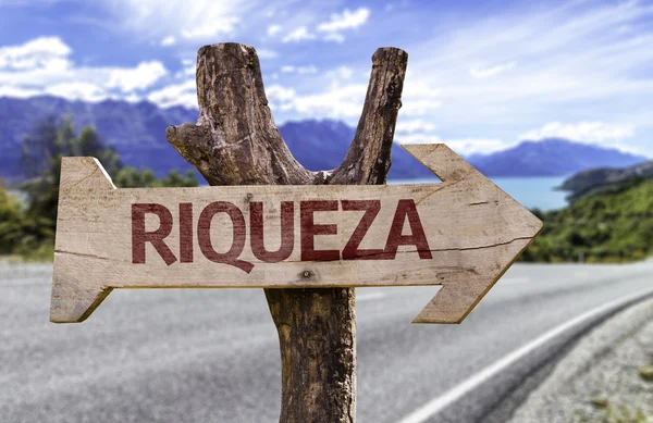 Riqueza ξύλινη πινακίδα — Φωτογραφία Αρχείου