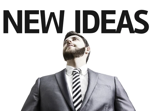 Business man with the text New Ideas in a concept image — Stock Photo, Image