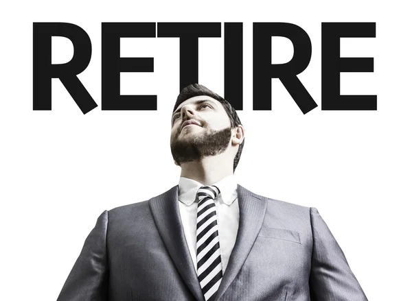 Business man with the text Retire in a concept image — Stock Photo, Image