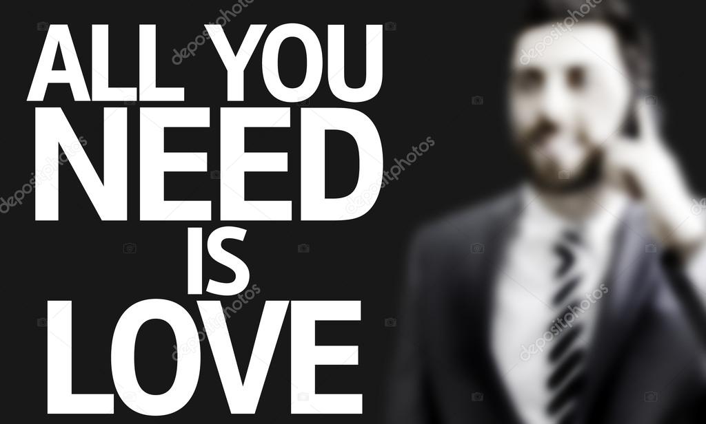 Business man with the text All you Need is Love in a concept image