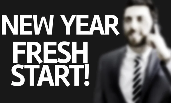 Hombre de negocios con el texto Año Nuevo Un nuevo comienzo en una imagen conceptual —  Fotos de Stock