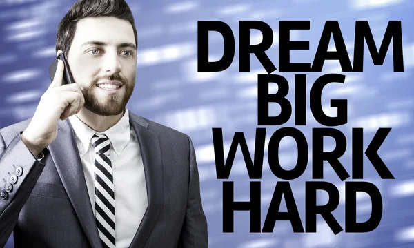 Hombre de negocios con el texto Dream Big Work Hard en una imagen conceptual —  Fotos de Stock