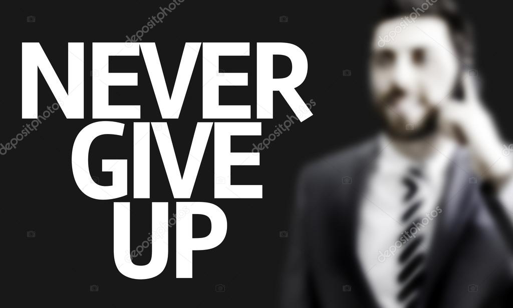 Business man with the text Never Give Up in a concept image