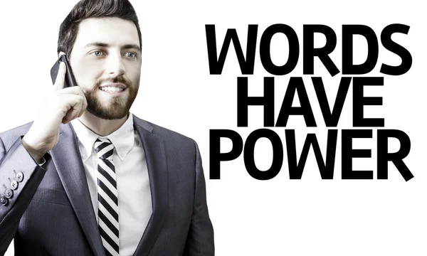 Affärsman med texten ord har makt i en koncept-bild — Stockfoto