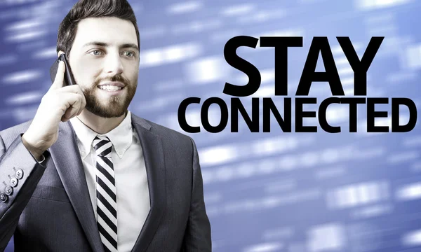 Business man with the text Stay Connected in a concept image — Stock Photo, Image