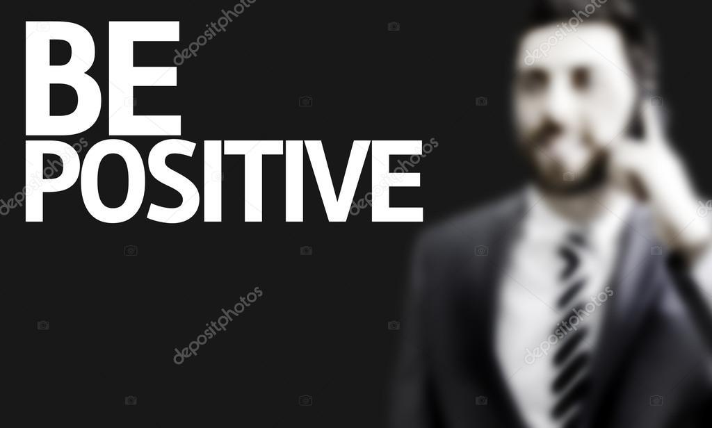 Business man with the text Be Positive in a concept image