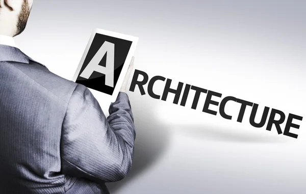 Homme d'affaires avec le texte Architecture dans une image conceptuelle — Photo