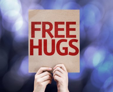 Free Hugs renkli arka plan üzerinde yazılı