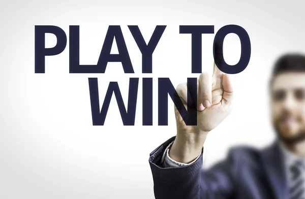 Bord met tekst: spelen om te winnen — Stockfoto