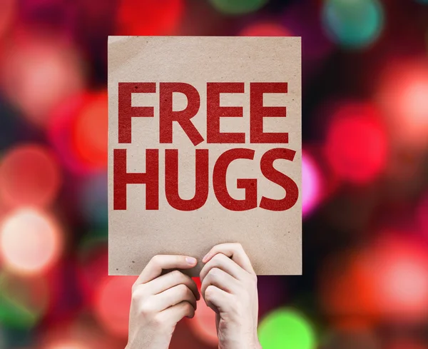 Free Hugs renkli arka plan üzerinde yazılı — Stok fotoğraf