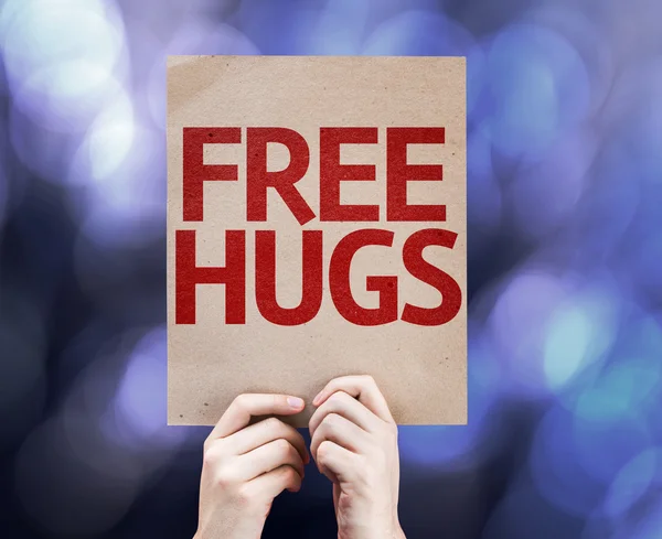 Gratis Hugs geschreven op kleurrijke achtergrond — Stockfoto