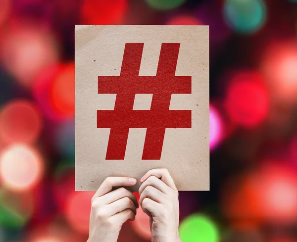 Hashtag pictogram geschreven op kleurrijke achtergrond — Stockfoto