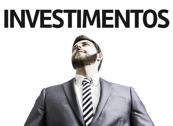 Business man with the text Investment (In Portuguese) — Stock Photo, Image