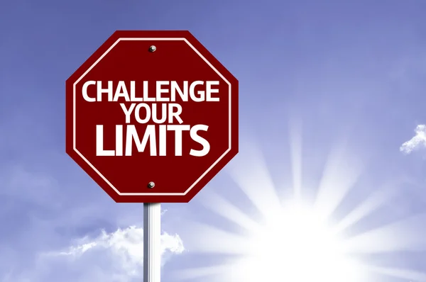 Challenge your Limits written on red road sign — Stock Photo, Image