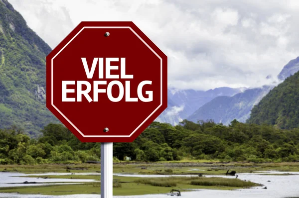 Much Success (In German) written on red road sign — Stock Photo, Image