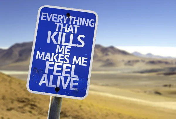 Everything That Kills Me Makes Me Feel Alive sign