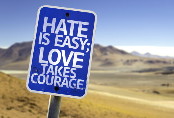 Hate is Easy Love Takes Courage sign