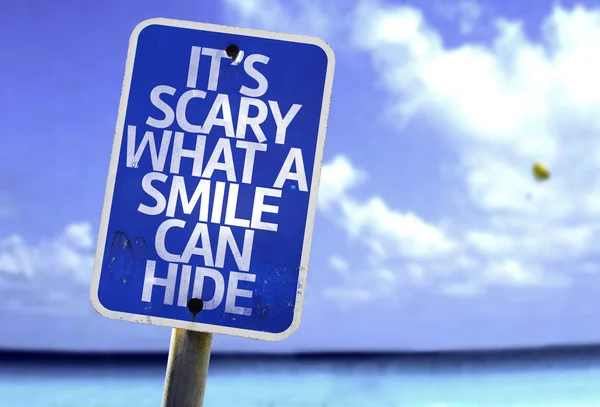 It's Scary What a Smile Can Hide sign — Stock Photo, Image
