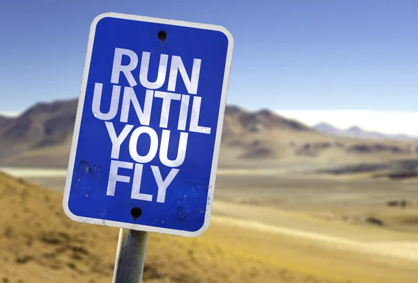 Run Until You Fly sign — Stock Photo, Image