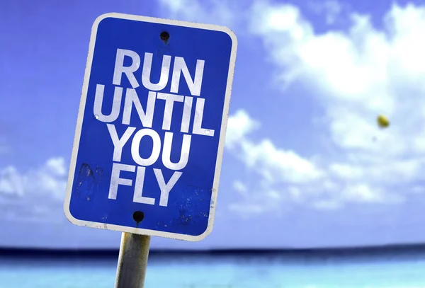 Run Until You Fly sign — Stock Photo, Image
