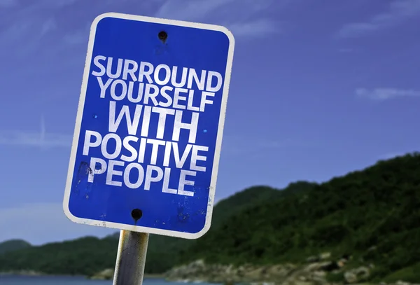 Circondati di segni di Persone Positive — Foto Stock