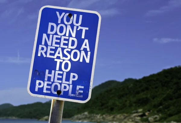 Du behöver inte en anledning till att hjälpa människor tecken — Stockfoto