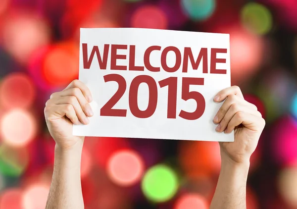 Tarjeta de bienvenida 2015 con fondo colorido con luces desenfocadas — Foto de Stock