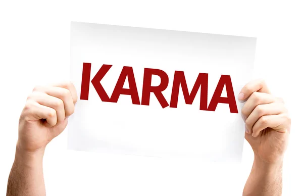 Karma kaart in handen — Stockfoto