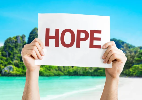 Hope card in hands — Stock Photo, Image