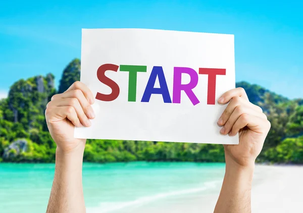 Start card in hands — Stock Photo, Image