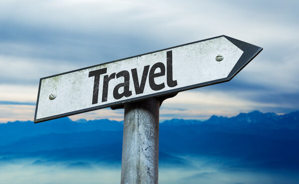 Travel sign with sky background