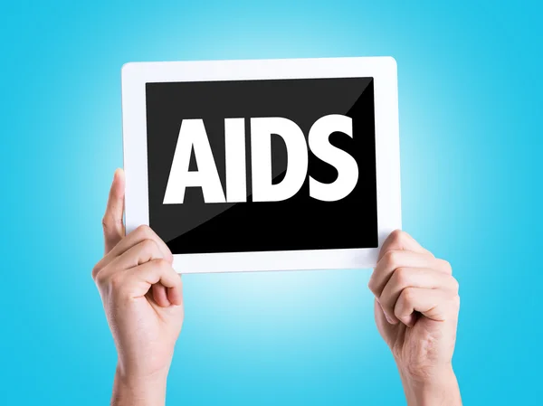 Tablet pc met tekst Aids — Stockfoto