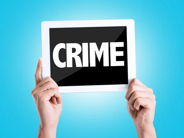 Tablet pc with text Crime — Stock Photo, Image