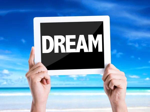 Tablet pc with text Dream — Stock Photo, Image