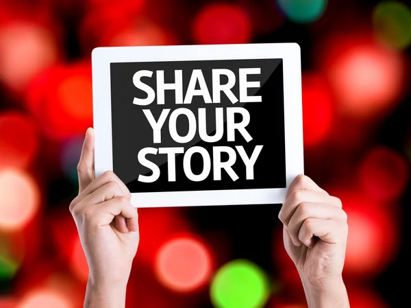 A tábla-pc-val szöveg Share Your Story — Stock Fotó