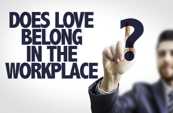 Board with text: Does Love Belong in the Workplace?