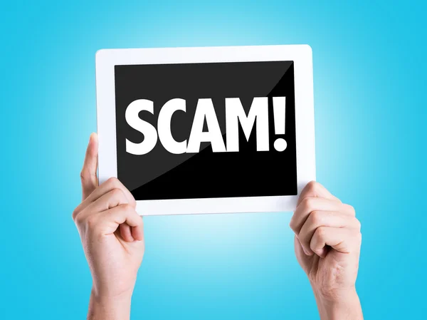 Tablet pc met tekst Scam! — Stockfoto