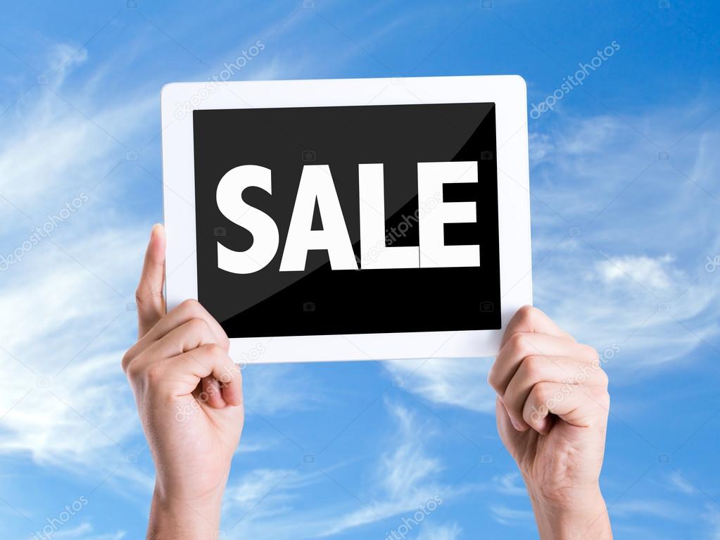 Tablet pc with text Sale