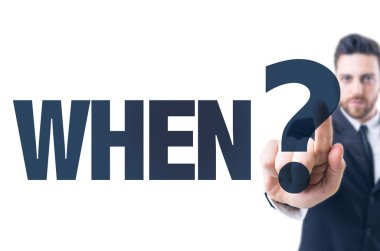 Metni işaret eden adam: ne zaman?