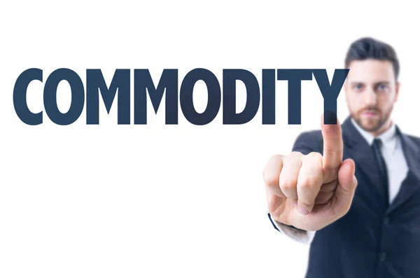 Muž s textem: komodity — Stock fotografie