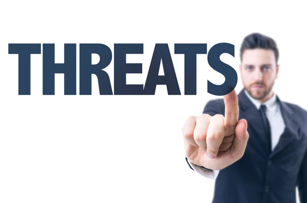 Business man with text: Threats — Stock Photo, Image