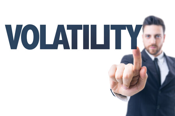 Бизнесмен с текстом: Волатильность
