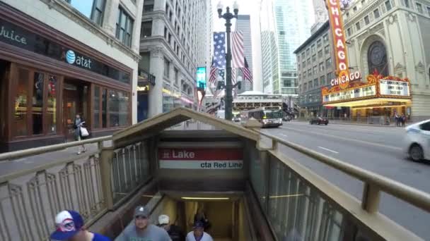 Downtown area riding down escalator — Stock Video