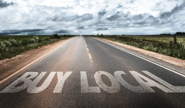 Buy Local written on road — Stock Photo, Image