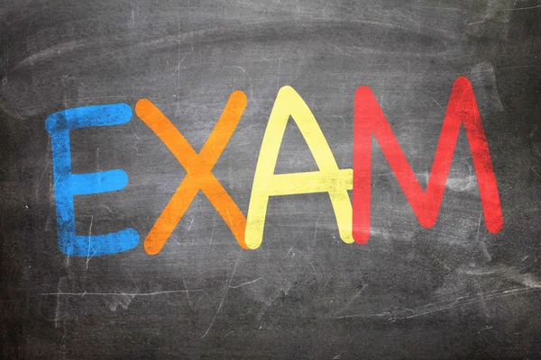 Exam written on a chalkboard — Stock Photo, Image